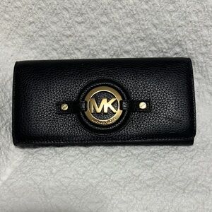 Michael Kors Black wallet clutch with Gold Emblem